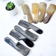 Hair comb made of horn with a blunt handle