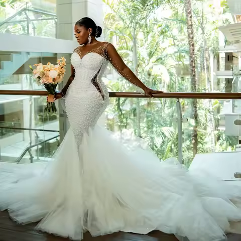 2025 Mermaid Wedding Dresses for Bride Sheer Neck Long Sleeve See Through Pearls Beading Nigeria Afr