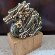 Dragon, goat, buffalo statue