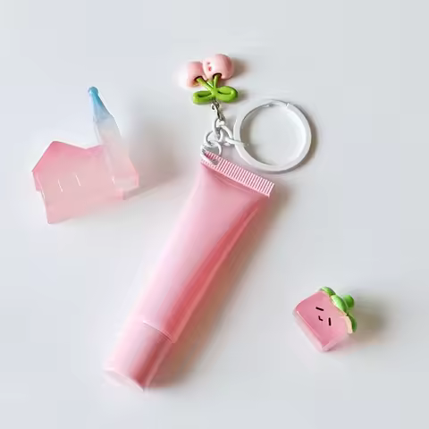 10/15ml Empty Lipstick Tube With Keychain Pendant Squeeze Sub-Bottling Refillable Liquid Container B
