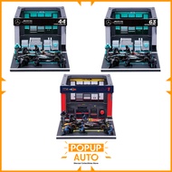 Bburago 1:43 F1 Formula Pit Pass - Red Bull Racing RB20/ Petronas F1 W15 / F1 W15 Team 63 / F1 McLar