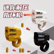 Mini finger decompression ring rotating gun cool and capable of firing shell throwing toy