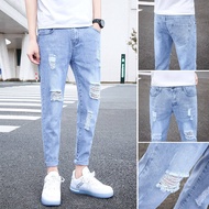 Autumn nine-point ripped jeans men's Korean version of slim-fit pencil pants beggar pants trend men's clothing bundle feet men's pants