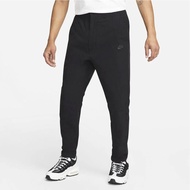 Nike Commuter Pants men's sports Pants made of thick poly with down-leg form - NBK Store