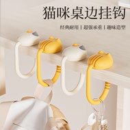 Cat tail-shaped under-table hanger 4.1x6.1x9.2cm