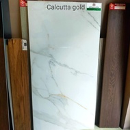 granit 60x120 megagalzer calcuta gold corak abstrak gold kw1
