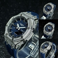 CasiOak GA-2100 in silver bezel with full moissanite, glossy silver index and navy blue rubber strap