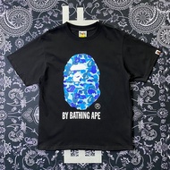 Bape เสื้อยืดรูปฉลามแขนสั้นมีตัวอักษรผ้าฝ้ายคอกลมแท้ใหม่หลวมไซส์ใหญ่ลำลองนักเรียนคู่ครึ่งแขนสไตล์เกา
