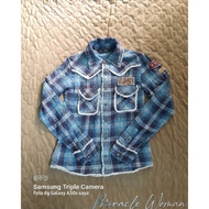 Women's flannel shirt by miracle woman