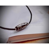 9-eye dzi necklace