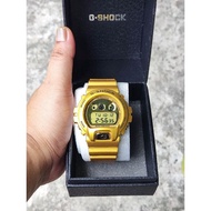 Dw-6900GD-9jf G-Shock gold colour