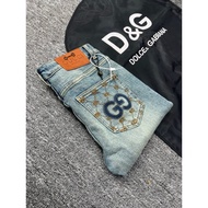 GC slimfit men's jeans in smooth dusty blue with embossed floral patterns and back pocket, simple de