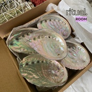 Abalone shell containing sage