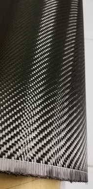 ผ้าใยคาบอน ผ้าคาร์บอน​ แท้​  ลาย​2  twill  weave สีดำ​ เงา  ผ้าคาบอน น้ำหนัก​  205​ กรัม​ carbon cloth toray​ yarn. 50 cm x 127 cm