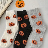 3 Pairs Of Black, White, And Gray Halloween Pumpkin Knee-High Socks For Men And Women To Wear As Gif