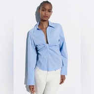 (available XS) Shirt code: 4437/057/400 knotted blue poplin fabric