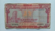 渣打銀行1977年100元（紅屋）一張中品F（G314859）