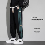 Men's Casual Sweatpants | Black Loose Cuffed Trousers with Green Side Stripe
