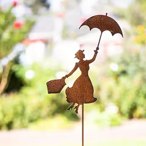 Rusty colored girl holding umbrella garden decoration with rust colored garden decoration with rust