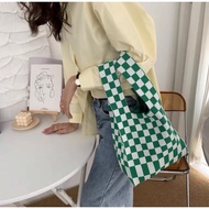 Exhibit Blue Checkered Bags