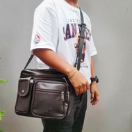 กระเป๋าสพายพาดลำตัว ใช้ได้ทั้งผู้ชายและผู้หญิง แบรนด์  WOLVES ORIGINAL แท้ 100%  หนัง pc กันน้ำ   ด้