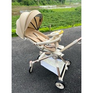 Xe đẩy đảo chiều gấp gọn cho bé cao cấp K8 có lò xo giảm sóc và vô lăng nhạc (tặng bàn ăn dặm)