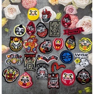 EVISU logos embroidered and ironed with evisu image. evisu logo