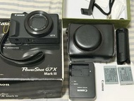 配件齊全：Canon PowerShot G7X Mark III 數位相機、電池充電器。