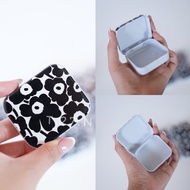 Marimekko tiny tin box Size 5x6 cm Height 15 cm.