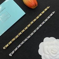 Tiffany & Co. 交叉雙色藍白鑽石手鍊（金色/銀色）