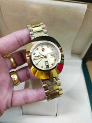 นาฬิกา ราโด้ รุ่น เดียสตาร์ หน้าปัดสีทองพลอยสามเม็ด สายสีทอง 38 mm automatic men’s Watch รับประกันภาพถ่ายจากสินค้าจริง