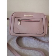 Jovanni pink sling bag