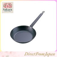 Endo Trading TKG Iron Frying Pan 26cm with embossed surface pattern. The uneven surface reduces the 