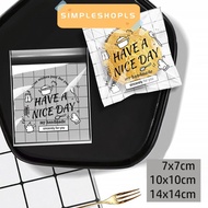 SIMPLESHOPLS 100Pcs Candy Gift Bags, Transparent Party Decor OPP Self Adhesive Pouch,  Have A Nice D