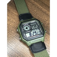[Watchwagon] Casio AE-1200WHB-3B Black Bezel Green Casing Green Cloth Band 10 Yrs Battery Life Digit