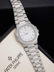 Patek Philippe Reference 3800/1 Nautilus | A white gold automatic wristwatch with date and bracelet,