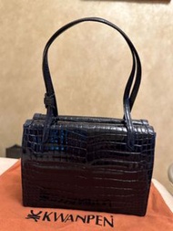 Kwanpen crocodile leather handbag