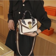 Women's handbag KT23cm crossbody bag made in Guangzhou and exported to Europe with wheel lock