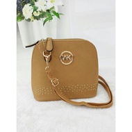 MK SLING BAG