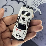 MINI GT NISSAN LB-ER34 SUPER SILHOUETTE ATHLETE/COLLET UNSEALED (1059) WHITE