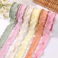 40mm and 25mm ruffled foam fabric ribbons in many colors to decorate flowers, gift boxes, and birthd