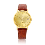 Patek Philippe Patek Philippe Calatrava (Reference 3445). A yellow gold wristwatch with date. 1964