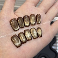 Nhat Phuong Nails B312 Nailbox brown background yellow cat eye medium form bearnailbox