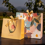 Beautiful Gift Bag tied with a sturdy, luxurious paper bow, Meaningful for Birthdays and Holidays