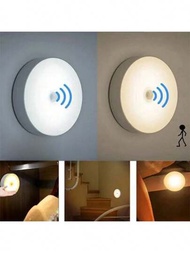 1個智慧型LED櫥櫃燈，單色按鈕控制可充電圓形迷你感應燈，具有溫暖和冷白光模式，長按調整亮度，適用於衣櫥，臥室，書桌，走廊，夜燈