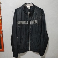 Jaket ellesse bahan parasut