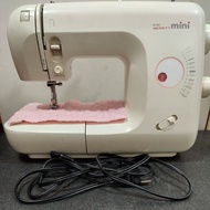 sewing machine portable running good condition pushbotton operate mini Merritt model singer brand