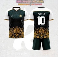 Jersey Futsal Desain Dayak Motif Etnik Dri-Fit Warna Emas hijau dengan Logo Personalisasi