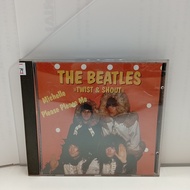 #F189-79 CD TERPAKAI. [THE BEATLES - TWIST & SHOUT] USED CD. #F189-79