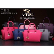 MK Selma Cross pattern handbag